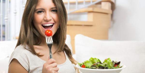 Lady eating salad